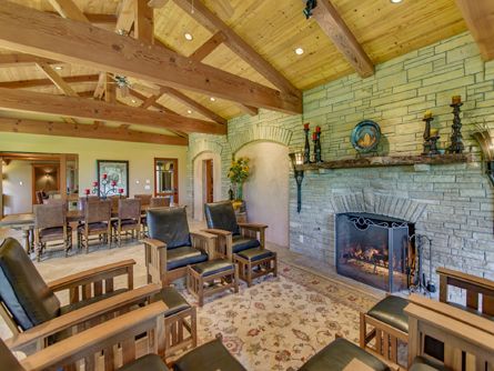 Spacious Entertainment Room with Fireplace