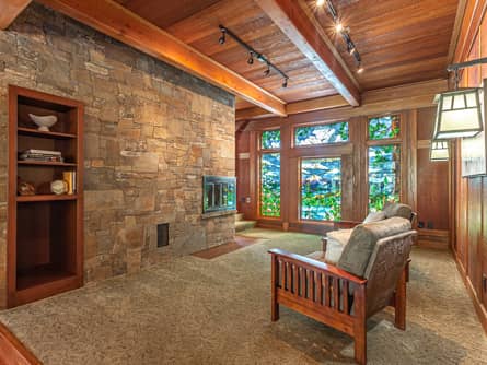 Intimate sitting area with fireplace & stained glass