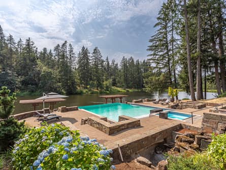 Poolside terrace with cascading waterfalls