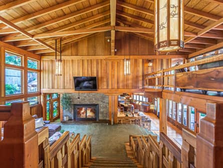 Vaulted Living Room with Stacked Rock Fireplace